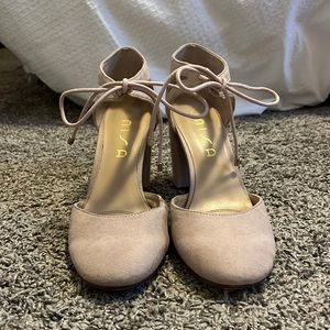 light pink closed toed tie heels